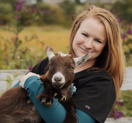 Women with goats